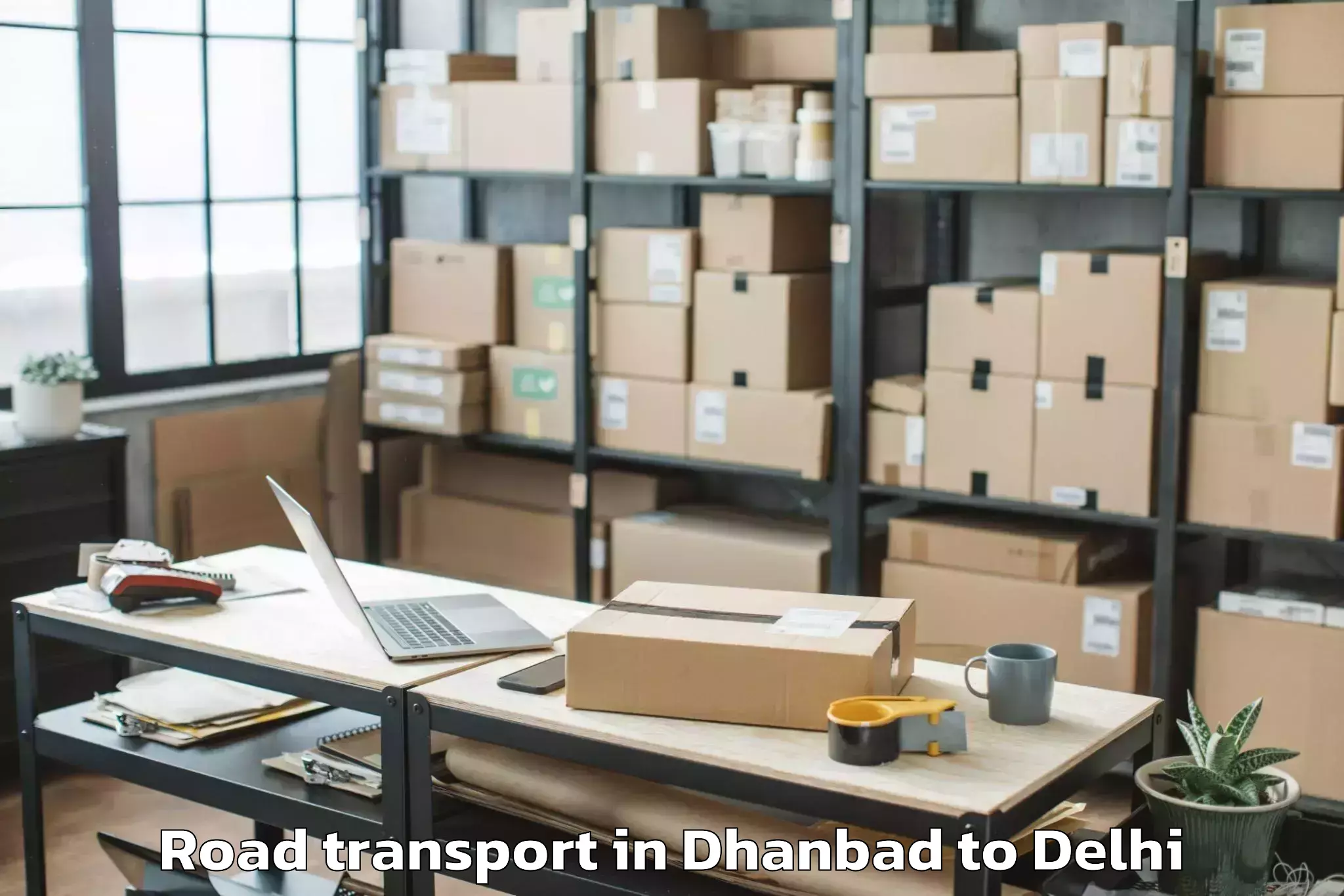 Book Dhanbad to Ambience Mall Rohini Road Transport